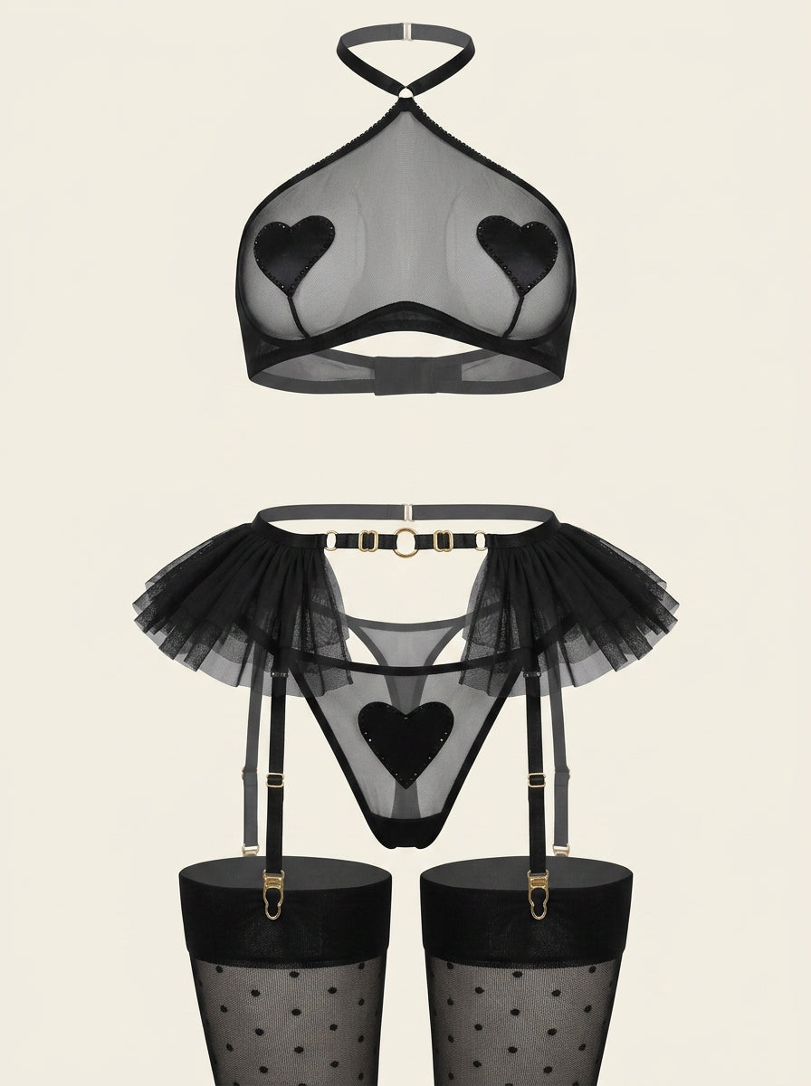 Completo lingerie seducente in rete nera con volant e spalline