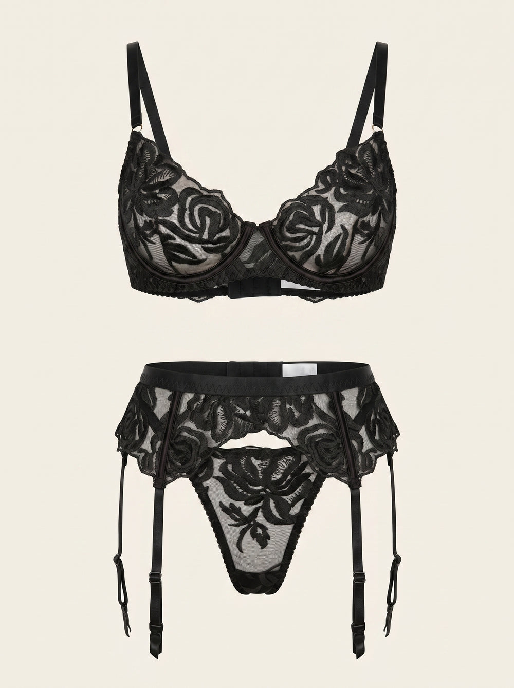 Schwarzes Dessous-Set mit Blumenstickerei und Strumpfgürtel
