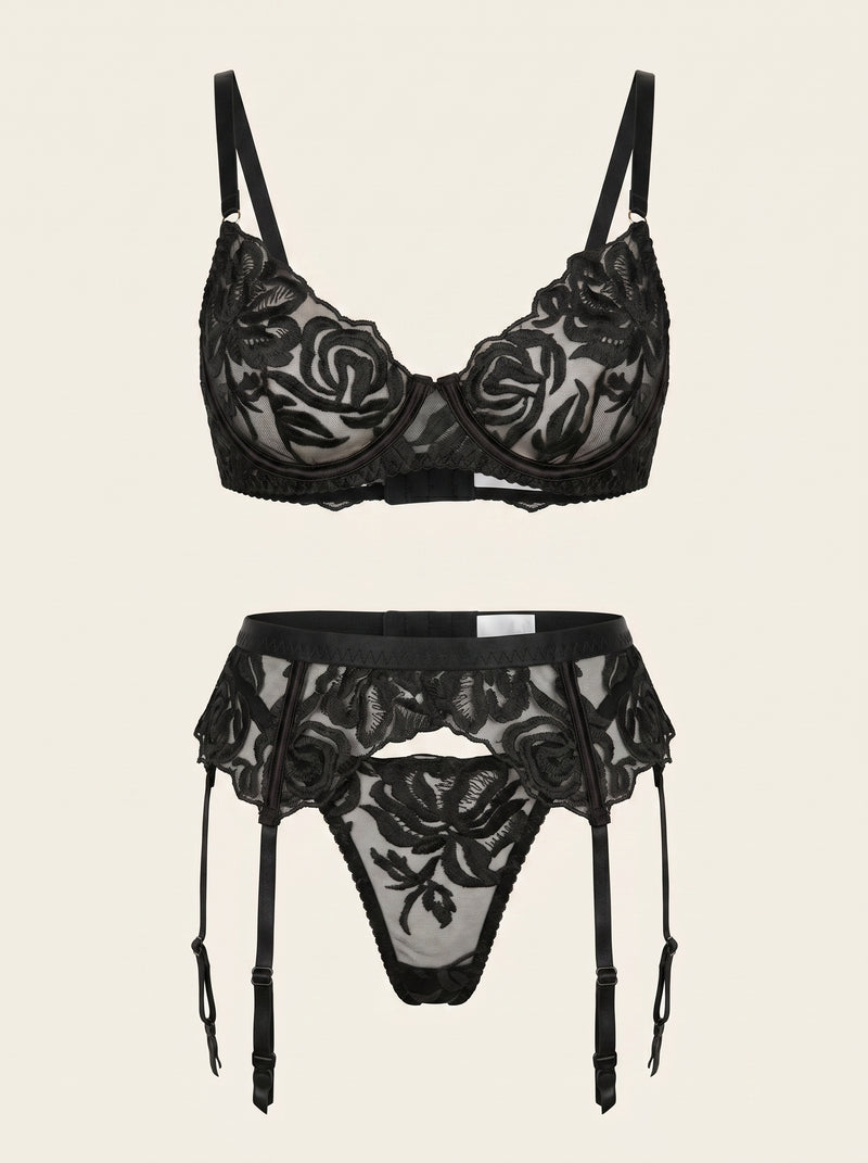 Zwarte geborduurde lingerieset met bloemen en jarretelgordel