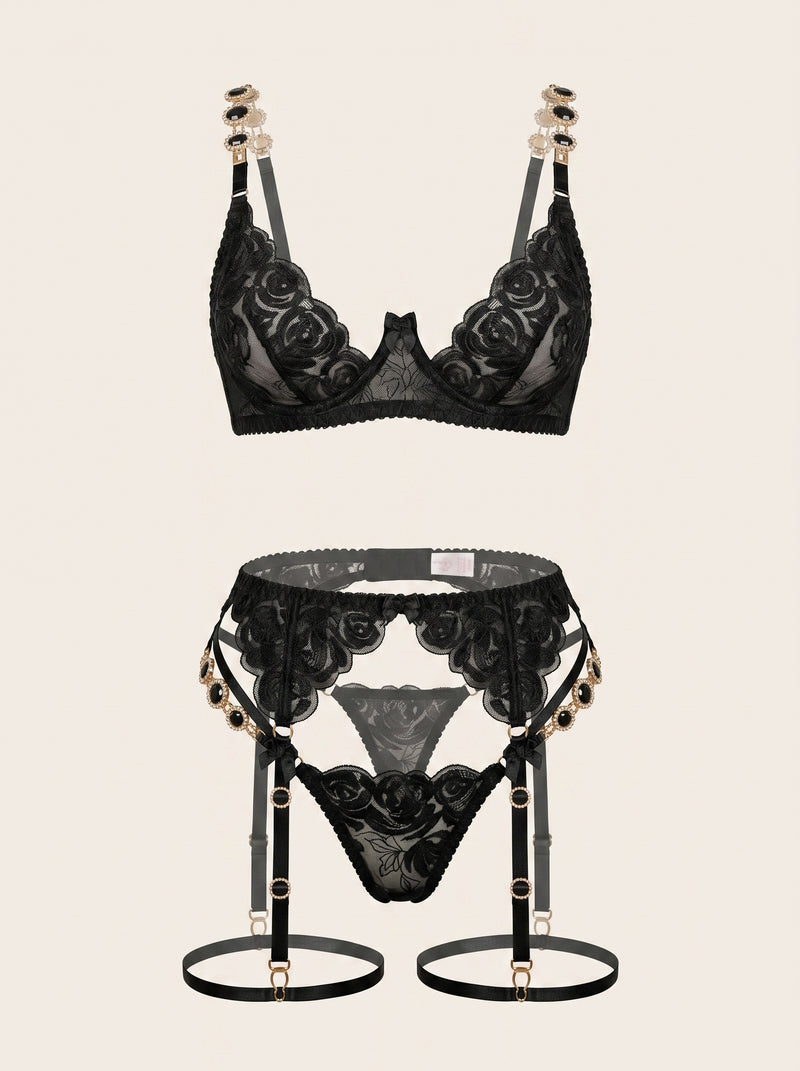 Zwarte kanten lingerieset met bloemen en geschulpte randen