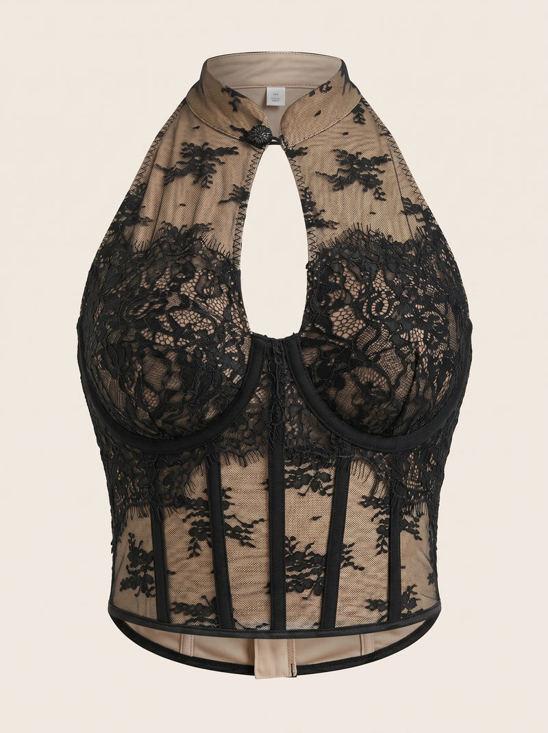 Bustier nero in pizzo con dettagli trasparenti e aperture