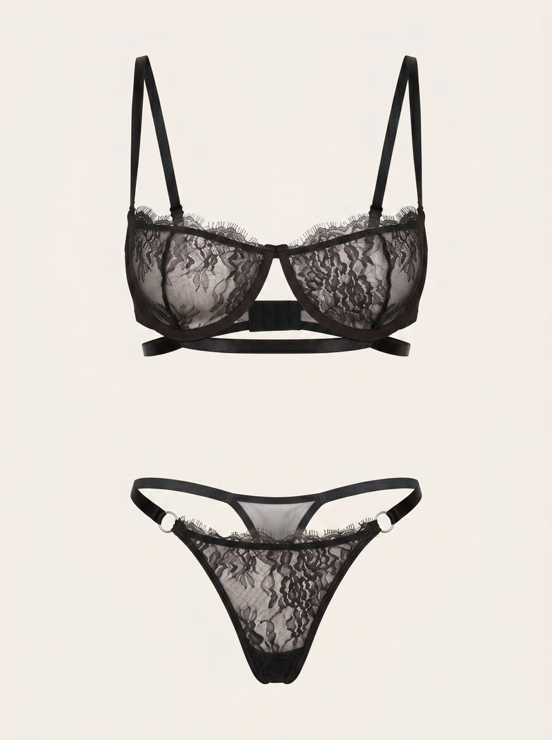 Set di lingerie in pizzo nero con dettaglio trasparente a strisce