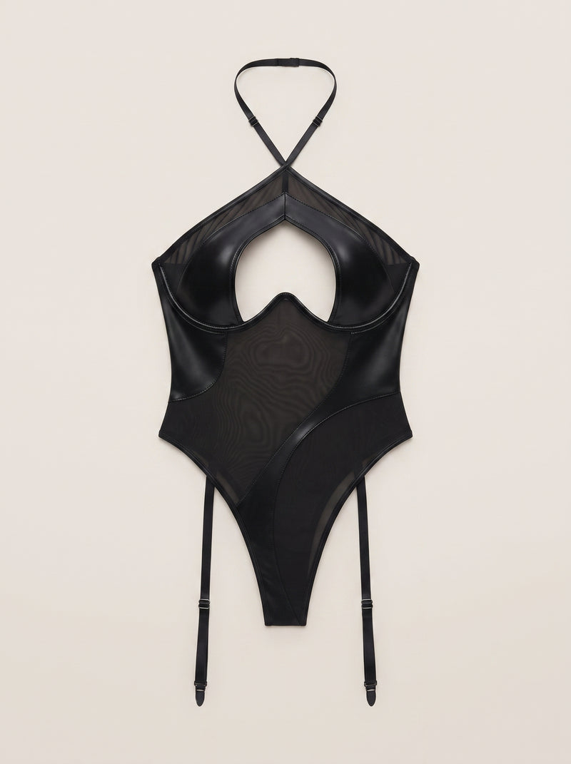 Body in mesh nero con design a intagli e stringhe