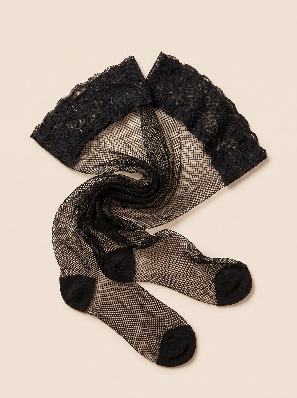 Collant in mesh nero con dettaglio del bordo in pizzo