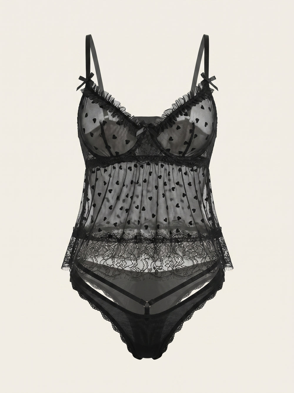 Set di lingerie nero in tulle trasparente a pois con volant