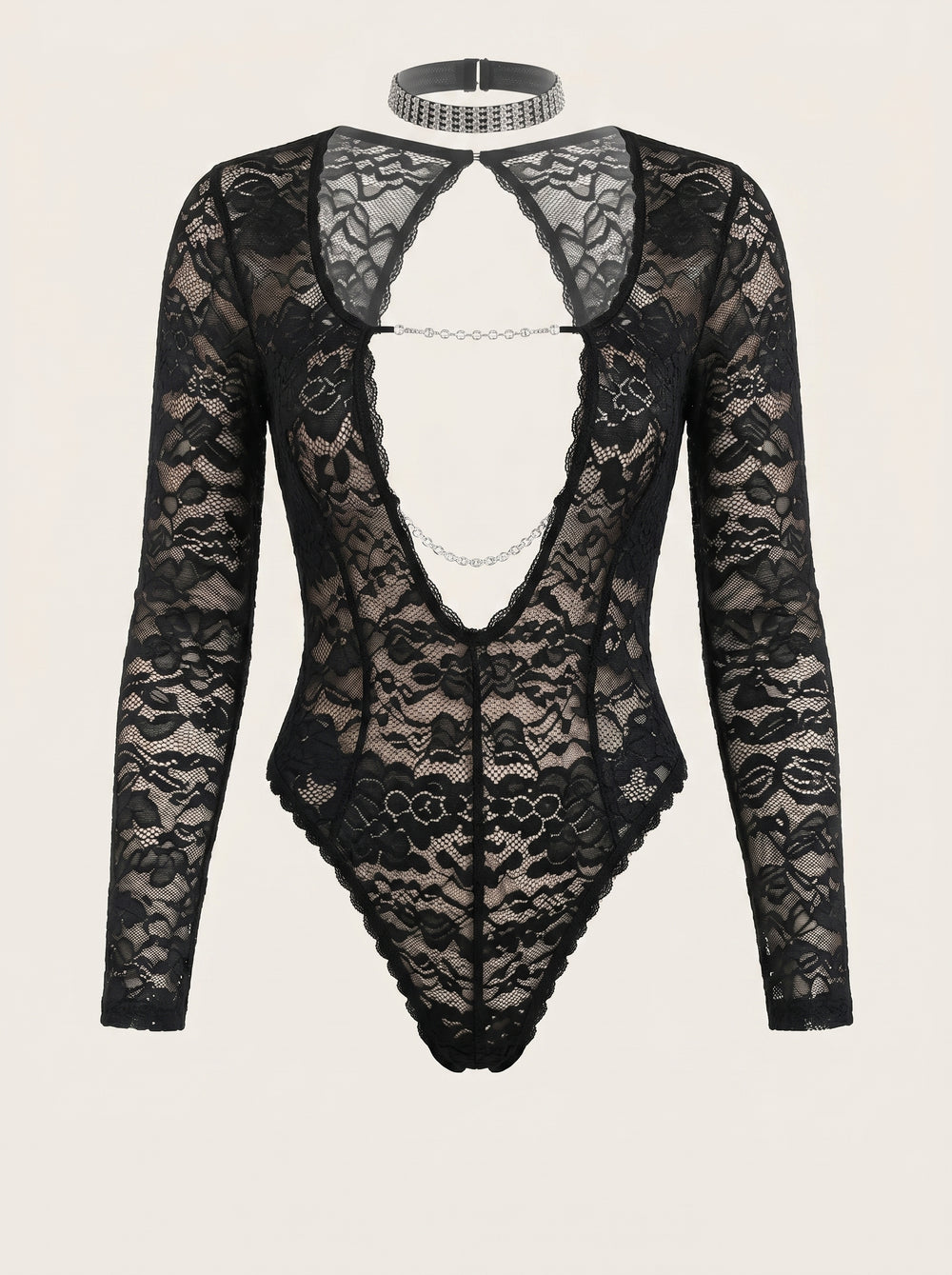 Body in pizzo nero con aperture e dettaglio a catena