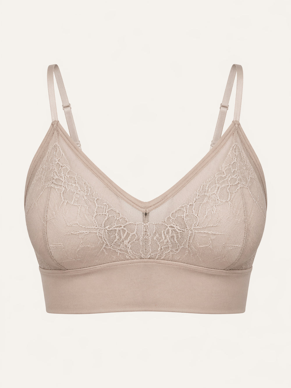 Reggiseno in pizzo beige con fiori, spalline regolabili e finitura trasparente