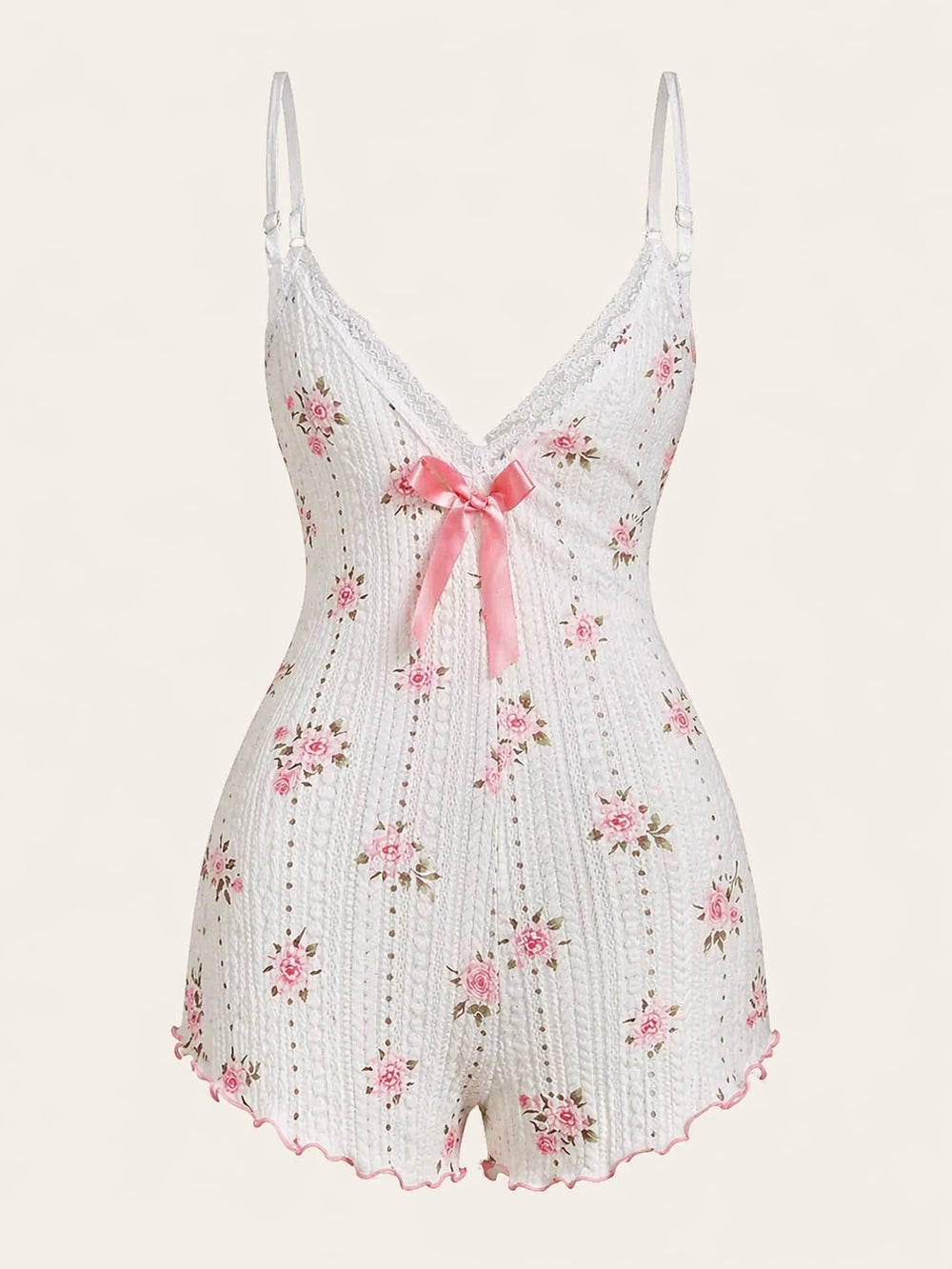 Tutina in cotone rosa con stampa floreale e bordi in pizzo