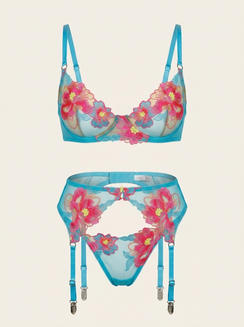 Completo lingerie in rete ricamata con fiori rosa e bordi smerlati
