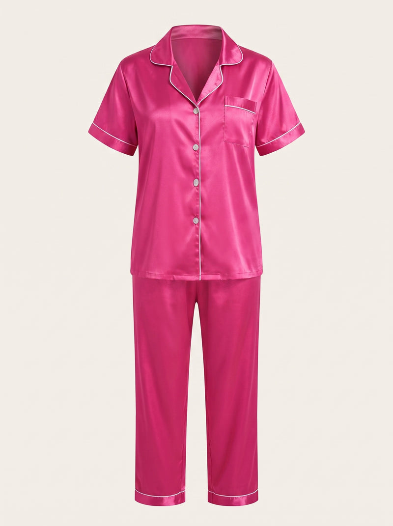 Ensemble de pyjama en satin rose vif avec fermeture boutonnée et passepoil contrastant