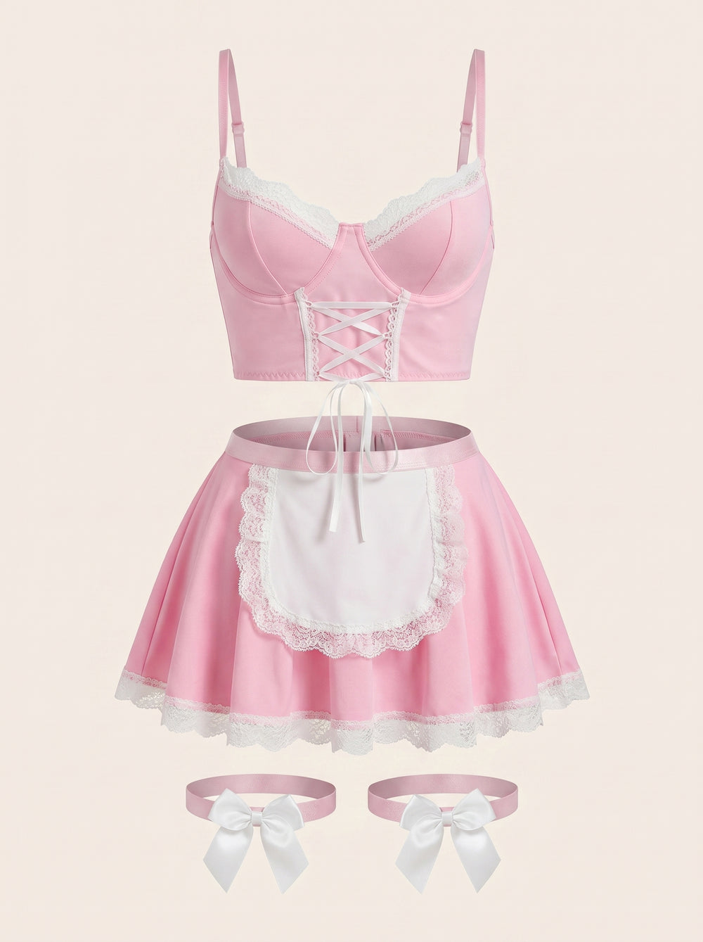 Set di lingerie in raso rosa chiaro con bordo in pizzo e stile corsetto