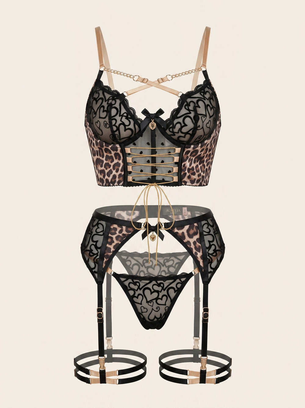 Completo intimo in mesh con stampa leopardata e dettagli a stringhe