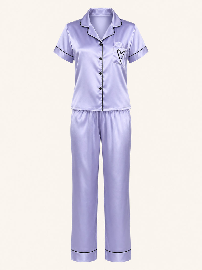 Ensemble de pyjama en satin bleu clair à manches courtes avec fermeture boutonnée