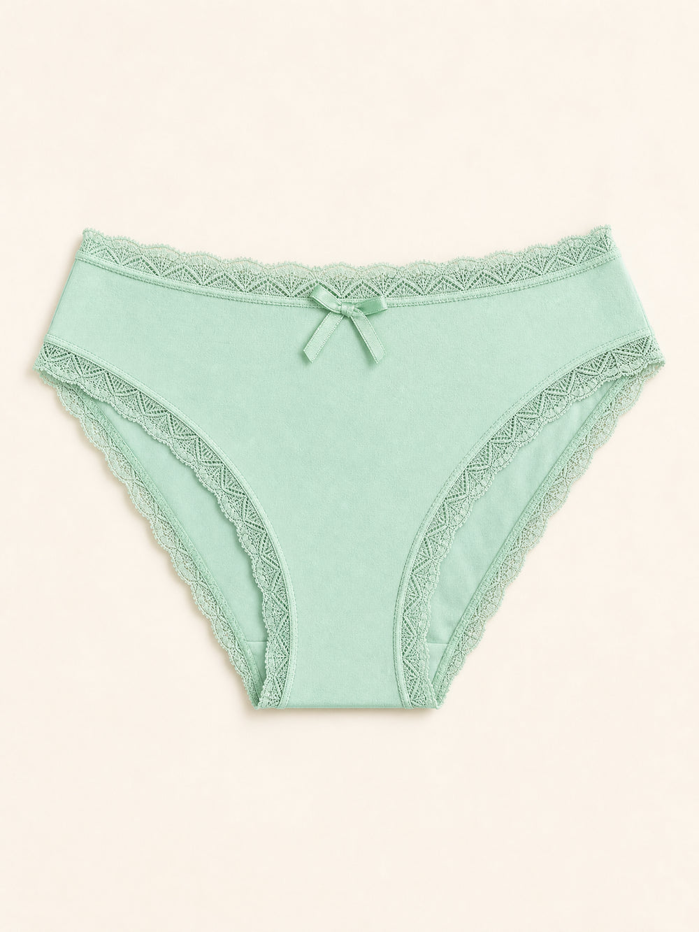 Slip in mesh verde menta con bordi in pizzo e fiocco