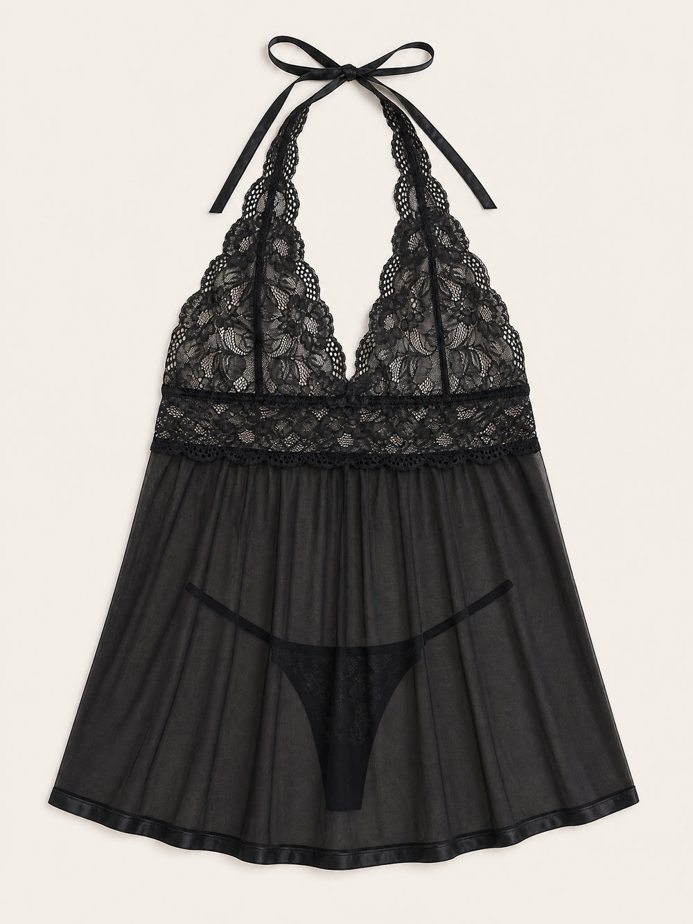 Babydoll in pizzo nero per taglie forti con design trasparente e spalline