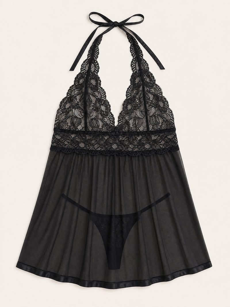 Babydoll in pizzo nero per taglie forti con design trasparente e spalline