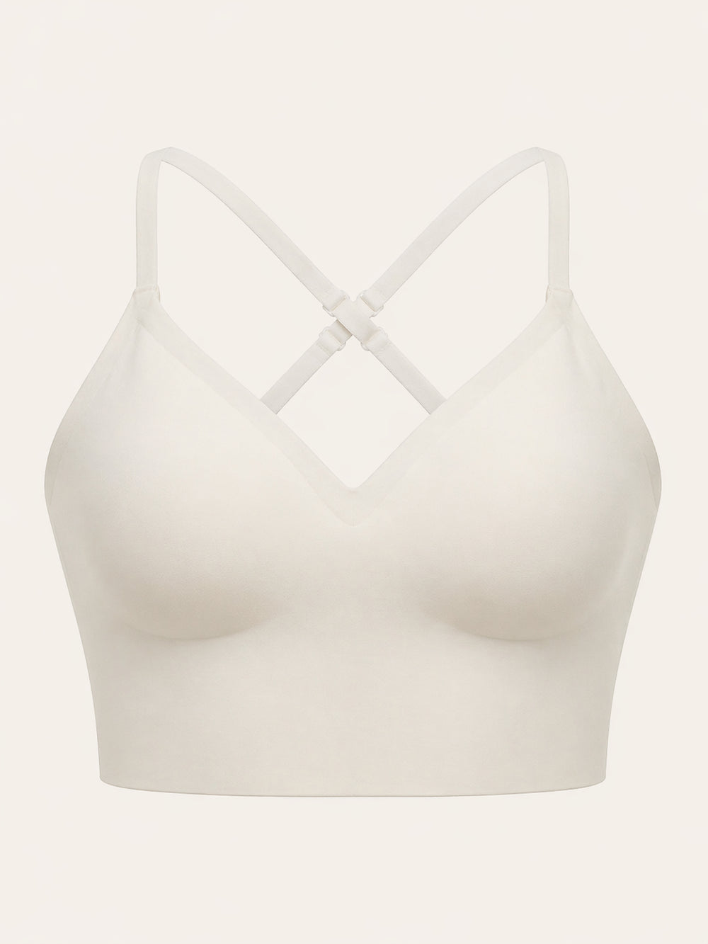 Reggiseno color crema in tessuto opaco, senza ferretto e senza cuciture, con dettaglio con spalline