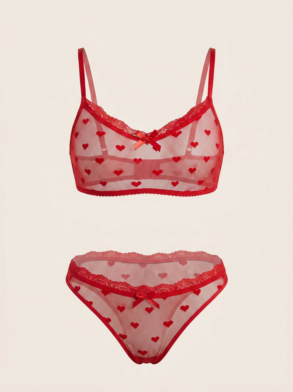 Set di lingerie in tulle rosso trasparente con motivo a cuori e design con spalline