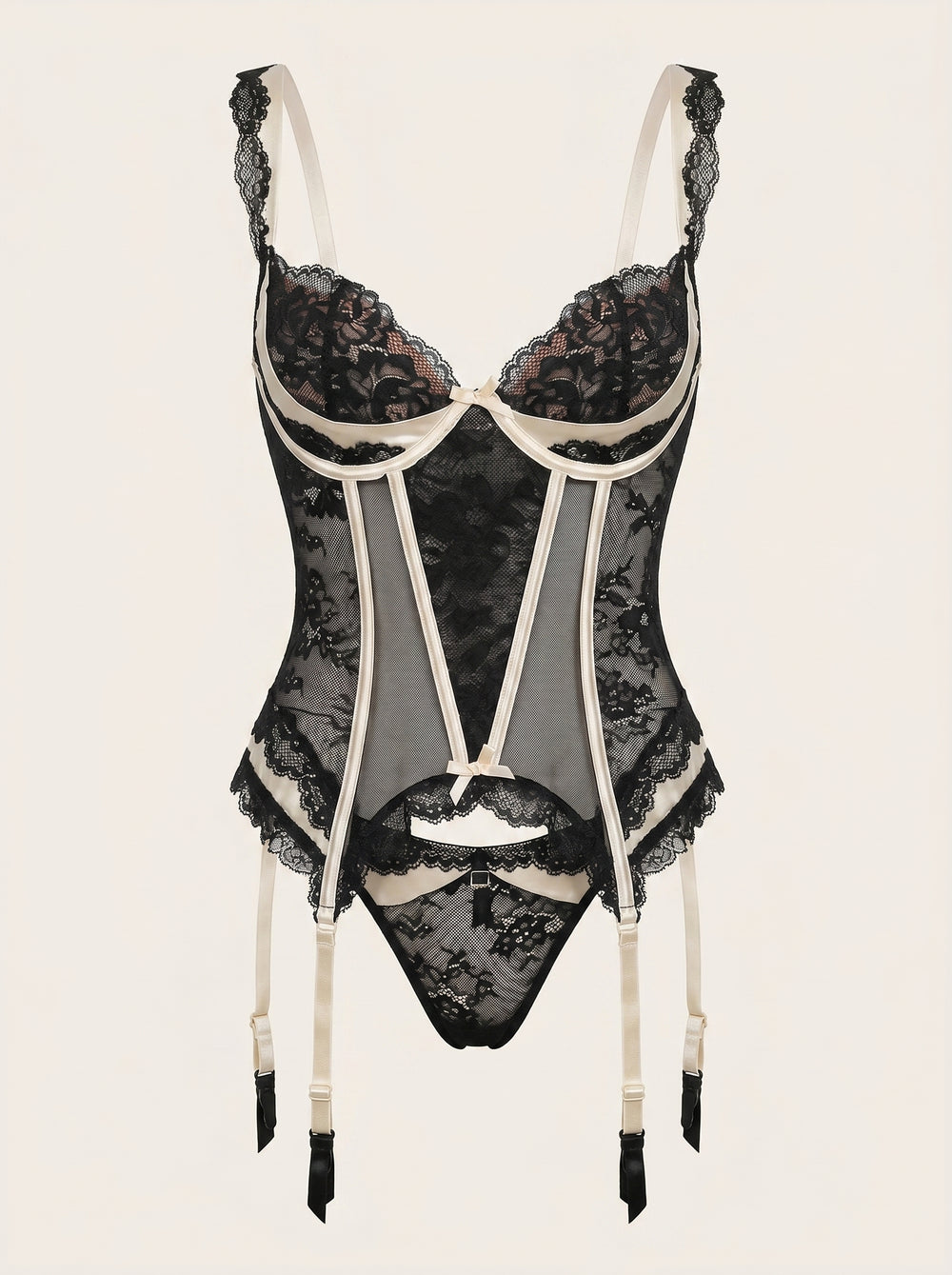 Set di lingerie nero in pizzo con spalline, reggicalze e reggiseno con ferretto