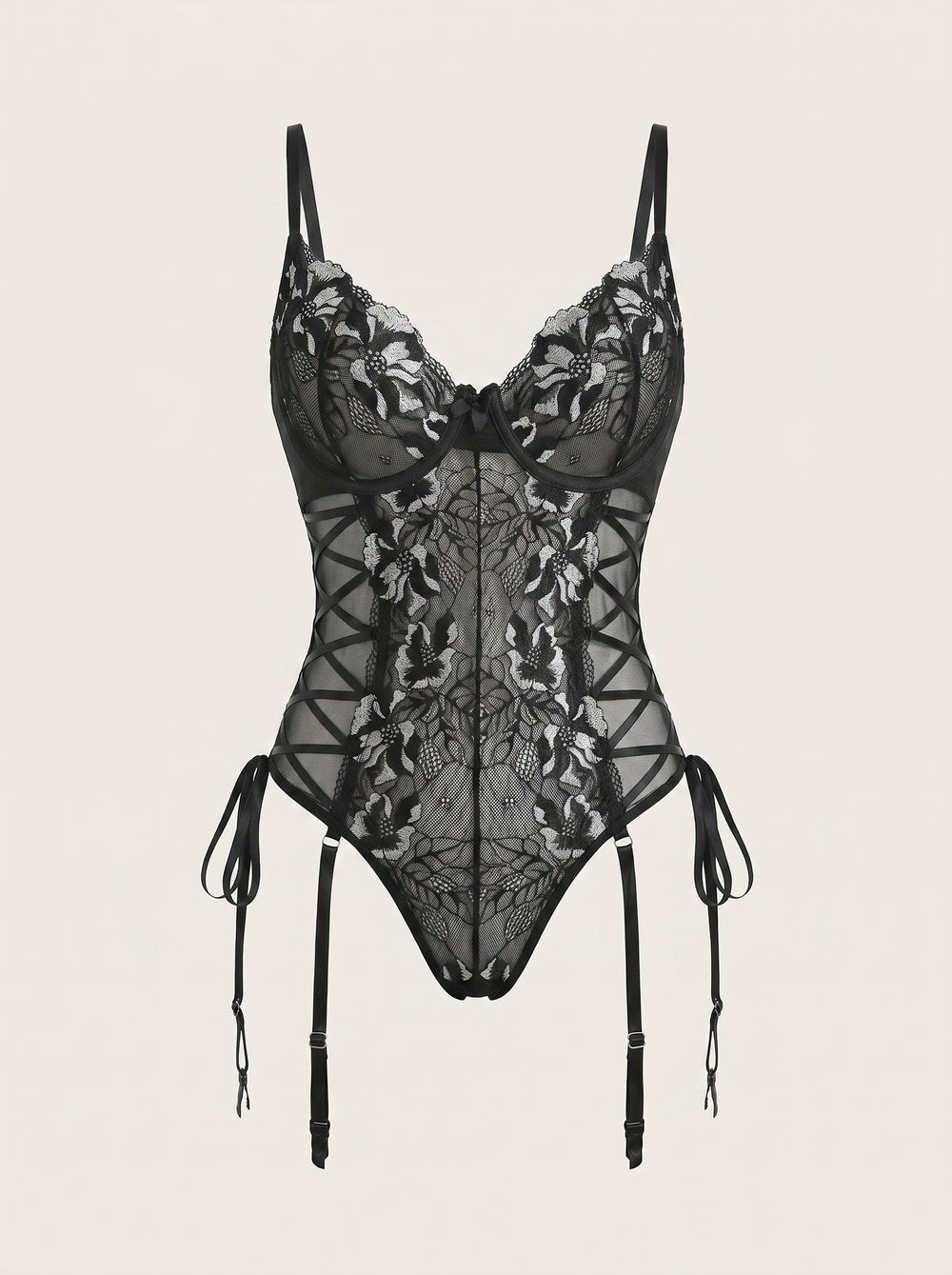 Body in pizzo nero e bianco con spalline e ferretto