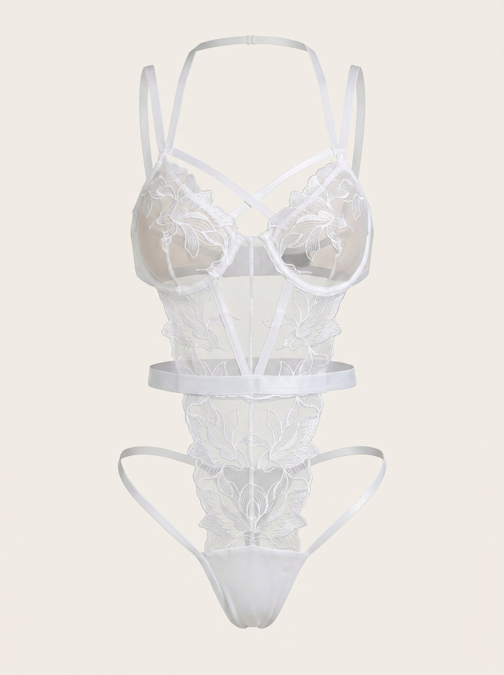Ensemble de lingerie en résille blanche à broderies florales, avec porte-jarretelles et détails à lanières