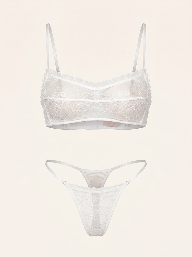 Set di lingerie in pizzo bianco con design trasparente a strisce